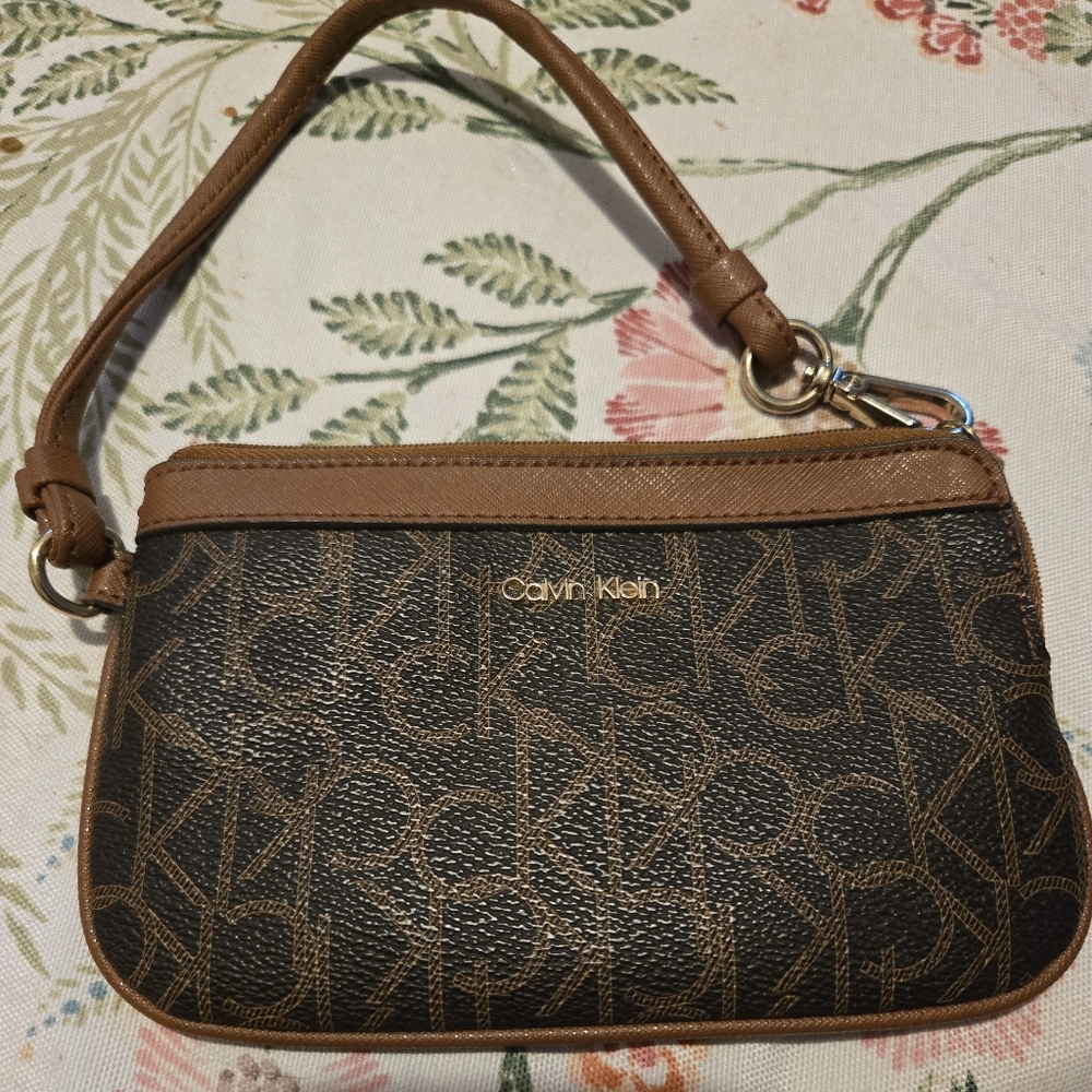 Calvin Klein Black and Brown Monogram Wristlet 7" x 4.5"x 0.5"